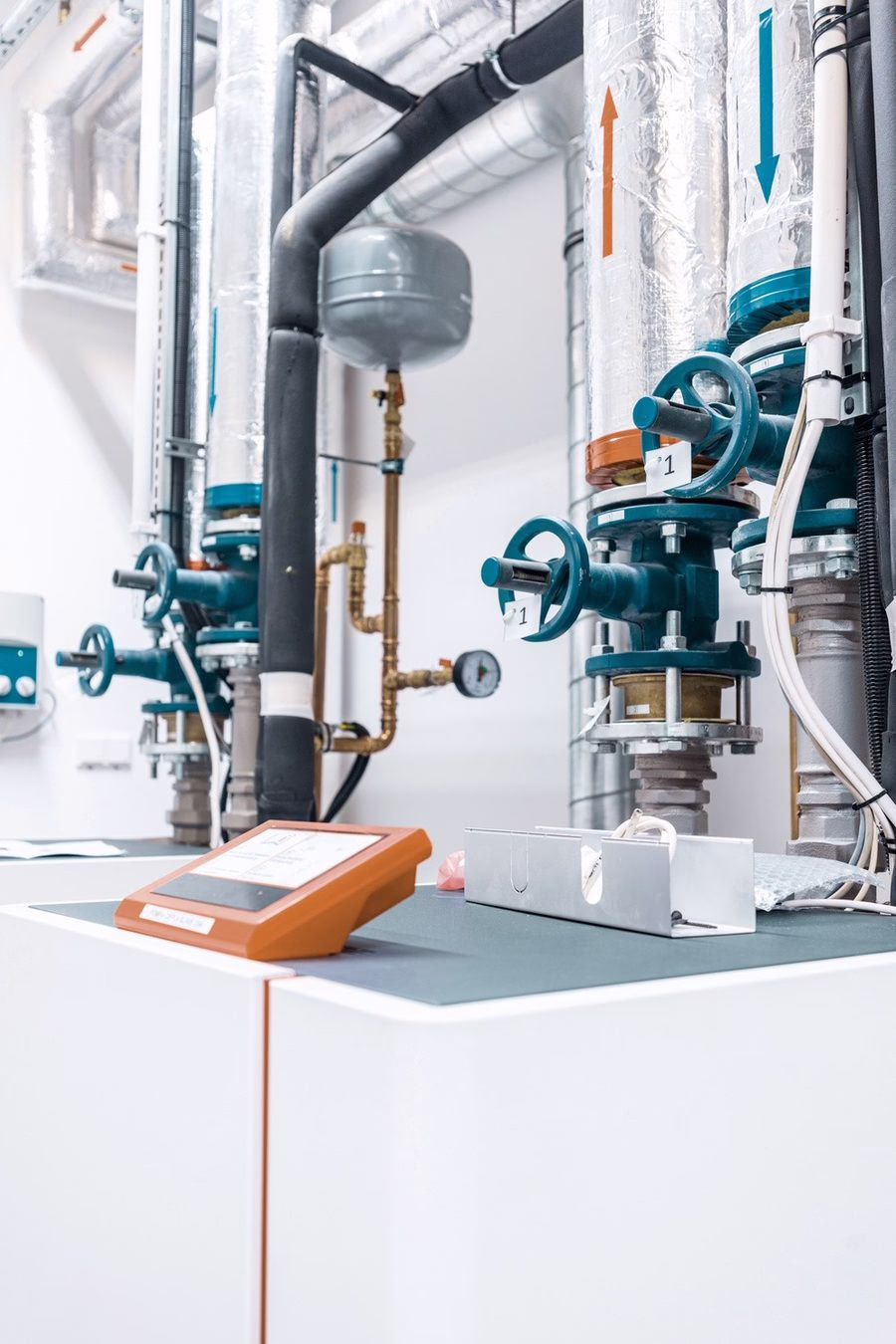 Geothermal mechanical room and piping